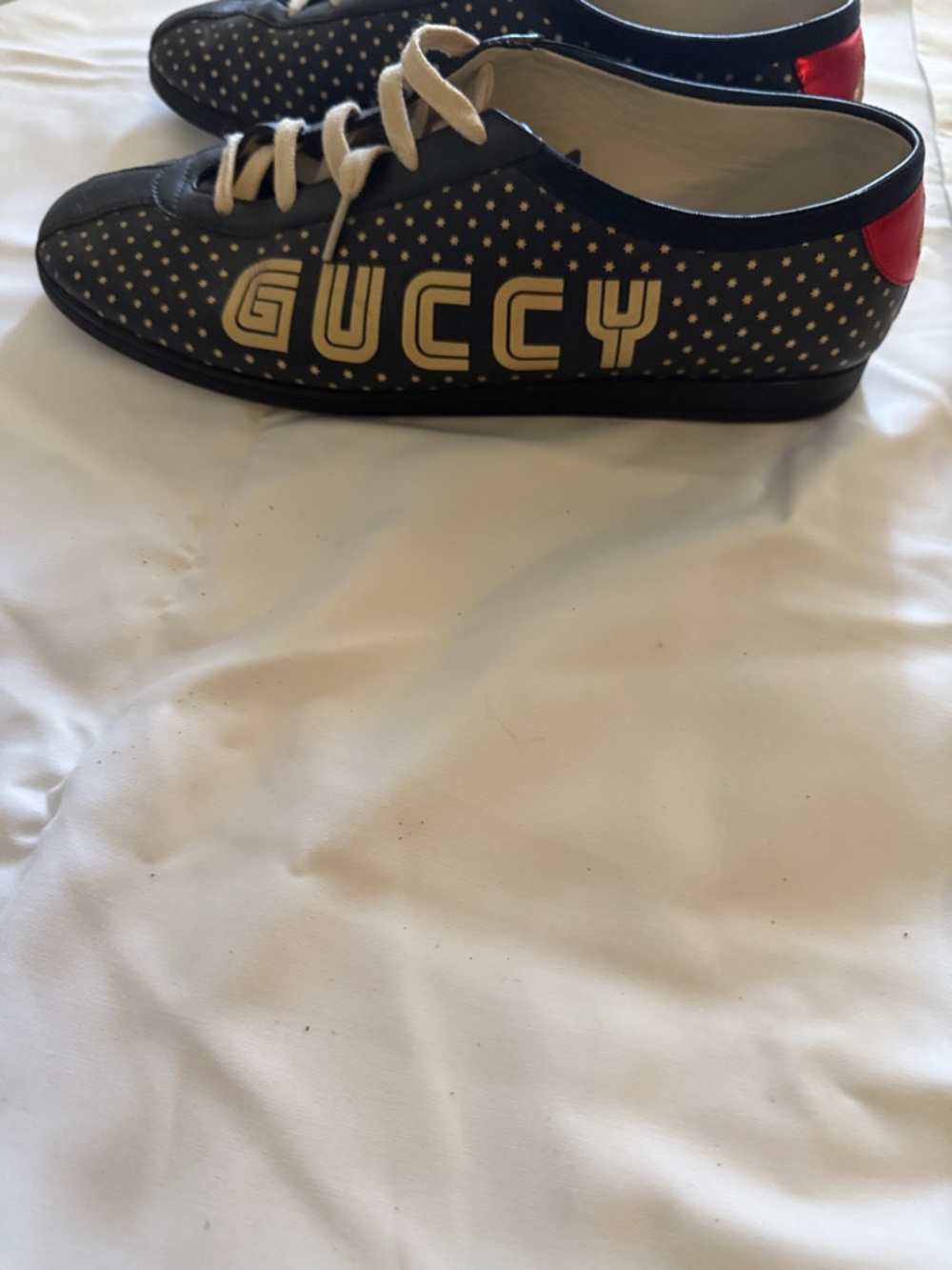 Gucci Black gold starsLow-Top Sneakers with Red Heel only worn hanful of times